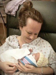 Kellie holding almost 2-day old Emma