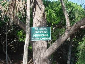Take Nothing - Leave Nothing - Disturb Nothing - Preserve Something Sign on Tree in Shaded Glade