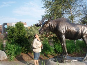 Charlene in front of a Moose Statue