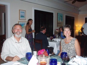 Herb and Chris O'Neil seated in the Fowl Cay dining room