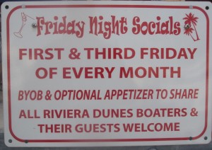 Sign telling about Friday Socials at the Marina