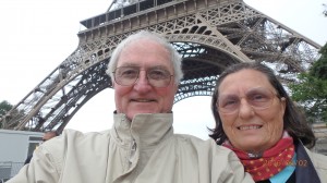 Rick and Charlene Smiling in front of the Eiffel Tower