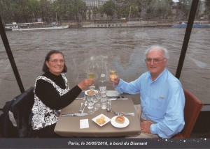 Rick and Charlene toasting champagne on the dinner boat