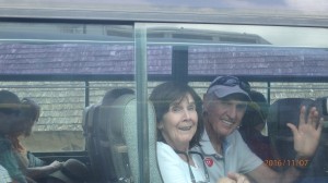Shirley and David Wilson through bus window