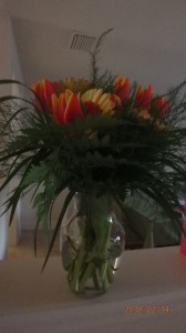 Orange and Yellow Flowers in glass vase