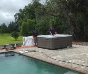 Hot Tub being placed on pool deck