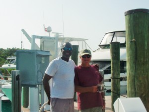 Preston Rolle and Rick on the dock at Compass Cay in 2015