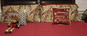 Garnet and Gold Bedding with a Christmas Moose and a pillow that says May your Seminole season be merry and bright