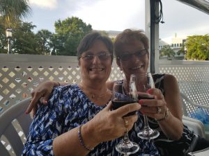 Charlene and Ruth toasting wth wine glasses