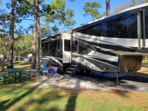 5th-wheel trailer parked at Salt Springs Campground