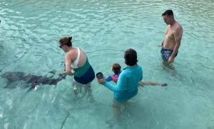 Lindsay petting shark with Charlene and Mat