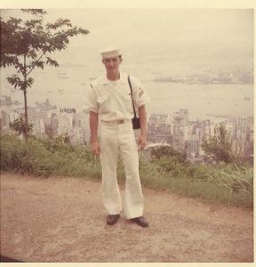 Rick in Navy whites overseas during the Vietnam war