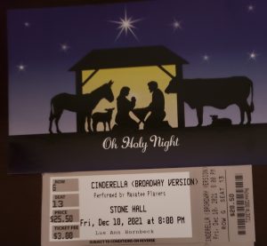 Christmas card with manger scene and ticket to show