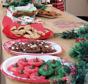 4 plates of Christmas Cookies on a table