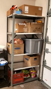 Metal shelving Unit with boxes and plastic tubs