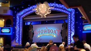 Screen on stages that says Showboat