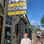 Jackie under the Black Dog Salvage sign in Roanoke
