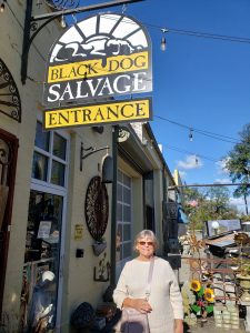 Jackie under the Black Dog Salvage sign in Roanoke