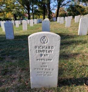 White carved gravestone of Richard Lindsay Day