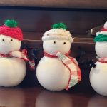 Six snowman ornaments with knit caps