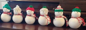 Six snowman ornaments with knit caps