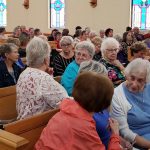 Church pews filled with women
