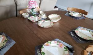 Table set with desert rose china